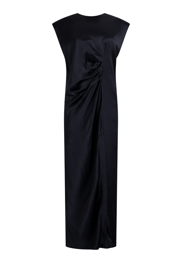 FRENKEN'S comfortable stretch-satin maxi dress is draped in a way that feels equally effortless and elegant. Raw-cut edge at the dramatically wide shoulders for a strong silhouette. Particularly long in length. Thoughtfully designed with gathered detailing, it offers a flattering fit that subtly conceals the midsection. Continue the leg-lengthening illusion of the glamorous front high-slit with point-toe pumps. Designed for a draped silhouette, cut to be worn very loose and very oversized. This dress ensure