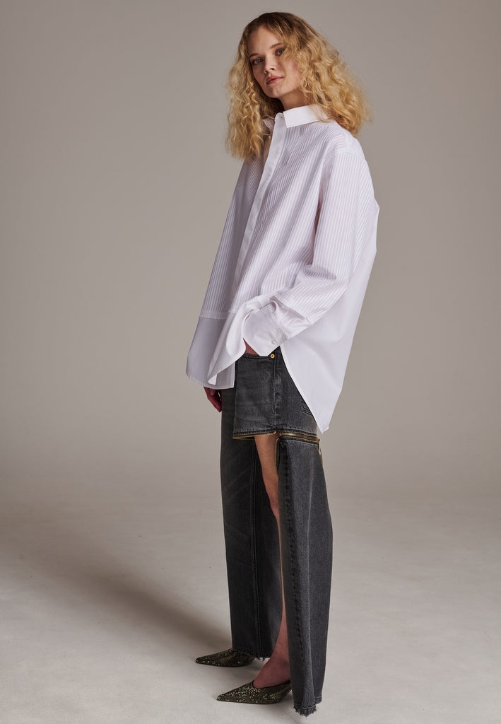 Oversized tuxedo shirt. Loved for its easy elegance, FRENKEN often updates its men-inspired shirts in different fabrics and finishes. This one is cut from tuxedo pleated cotton poplin and has a very oversized loose shape. The styling possibilities are endless - it's truly a must-have.