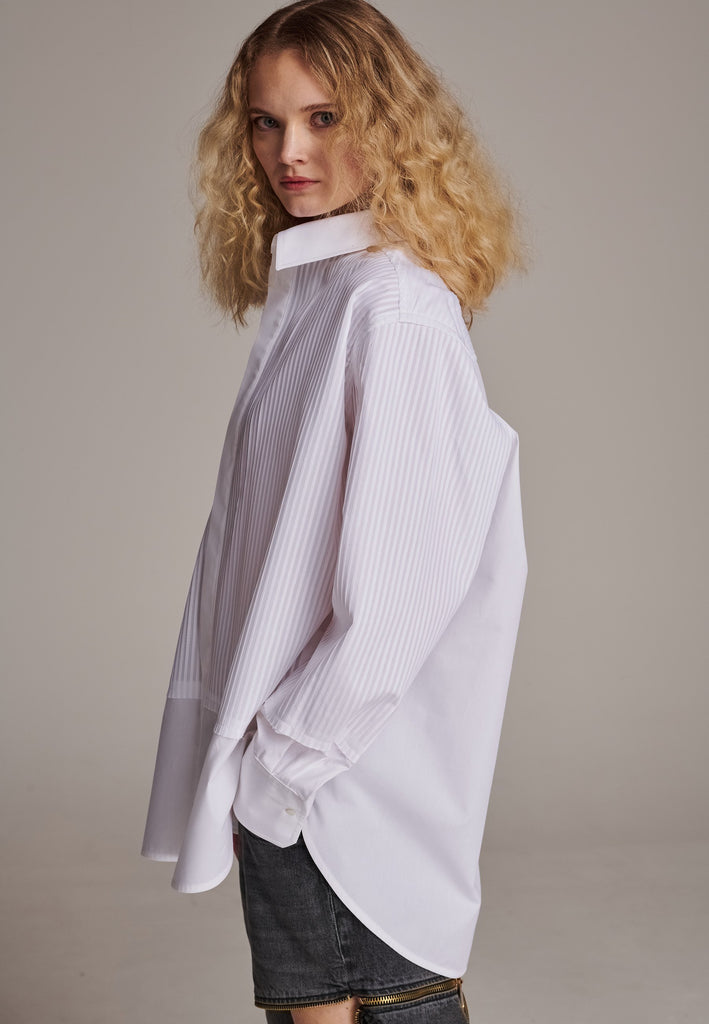 Oversized tuxedo shirt. Loved for its easy elegance, FRENKEN often updates its men-inspired shirts in different fabrics and finishes. This one is cut from tuxedo pleated cotton poplin and has a very oversized loose shape. The styling possibilities are endless - it's truly a must-have.