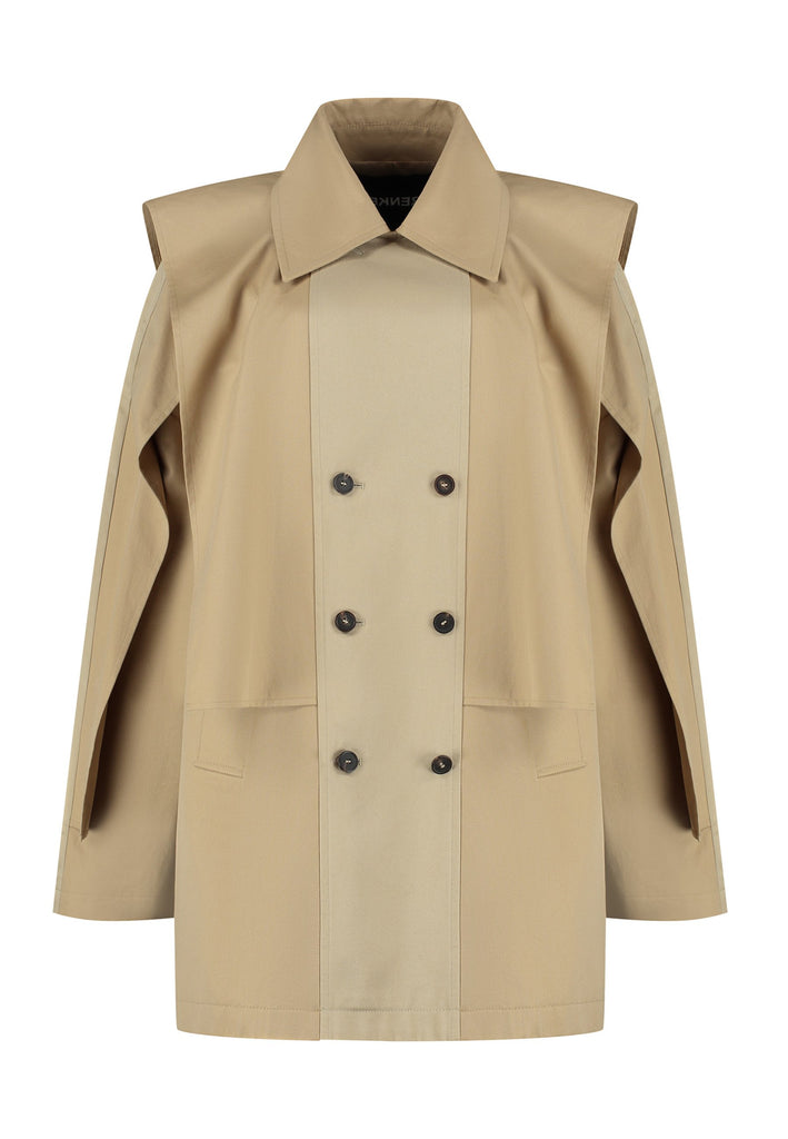 Inspired by a men's coat, FRENKEN offers a refined, contemporary twist on classic outerwear. Designed with dual-tone camel panels that create a subtle yet striking contrast, it exudes effortless sophistication. Featuring squared draped fabric, the coat showcases a modern, architectural design. Made from water-resistant cotton, it combines style, versatility, and functionality for everyday wear.