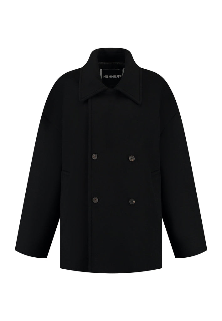 Beautifully designed and inspired by the classic men’s peacoat, this piece is tailored for an oversized fit that offers both comfort and warmth. Expertly tailored in Portugal from a soft, naturally insulating wool cashmere blend. Crafted to be worn loosely, it envelops you in cozy luxury while providing excellent protection against the cold. A must-have for those seeking both style and functionality in their outerwear. Layer it over everything from tailored trousers to casual denim for an instantly elevated