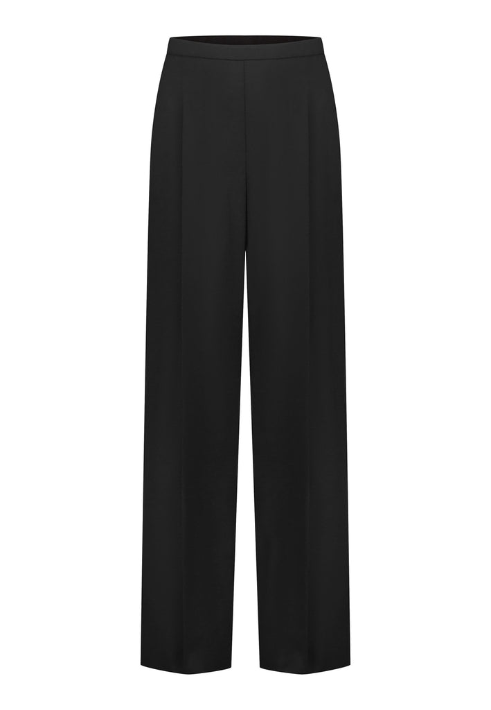 Made from a mix of polyester, wool, and elastane, they offer a soft, stretchy feel with a flattering drape. Designed with an elastic waistband, these pants ensure all-day comfort and a flexible fit. Featuring invisible zipper slits on both legs, they add a modern, stylish edge while allowing for ease of movement.