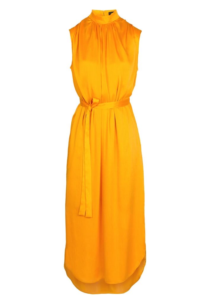 Conceal | Dress | Orange. Maxi dress in a wrinkle flowy satin light fabric. Wear it with the belt to create a waist or wear it without the belt and let the dress hang loose. Model wears a size 36.