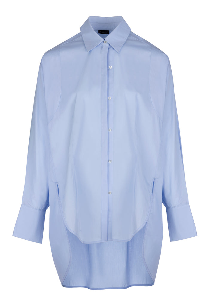 Double Placket | Shirt | Light Blue. Crispy poplin oversized shirt front panel smaller then back panel to give coverage in back and shape in front. Detailed with a double placket.