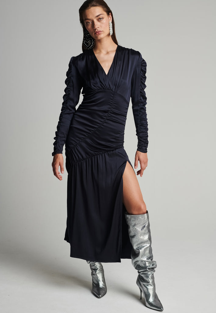 Satin midi dress in navy. Features a v-neck, wrinkled-style hip and arms, and leg opening. True to size.