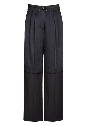 Wide-leg pants with insideout details. Features pockets, fully lined top and pressed creases. Fits oversized.