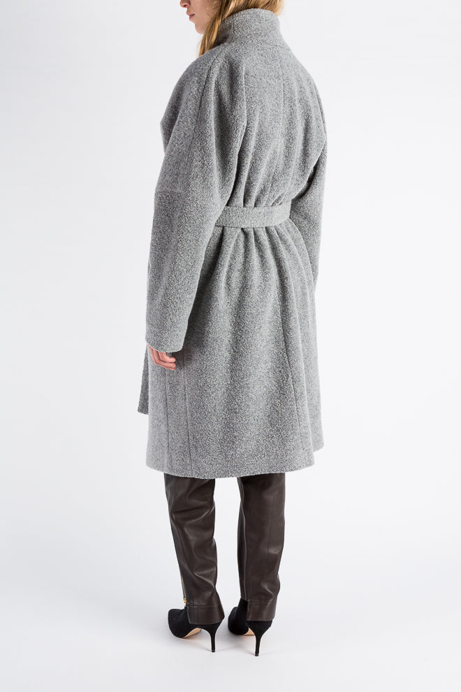 Fluster | Coat | Light Grey Melange. Wrap coat with two-tone paneling. Belt closure and side pockets. Loose fit